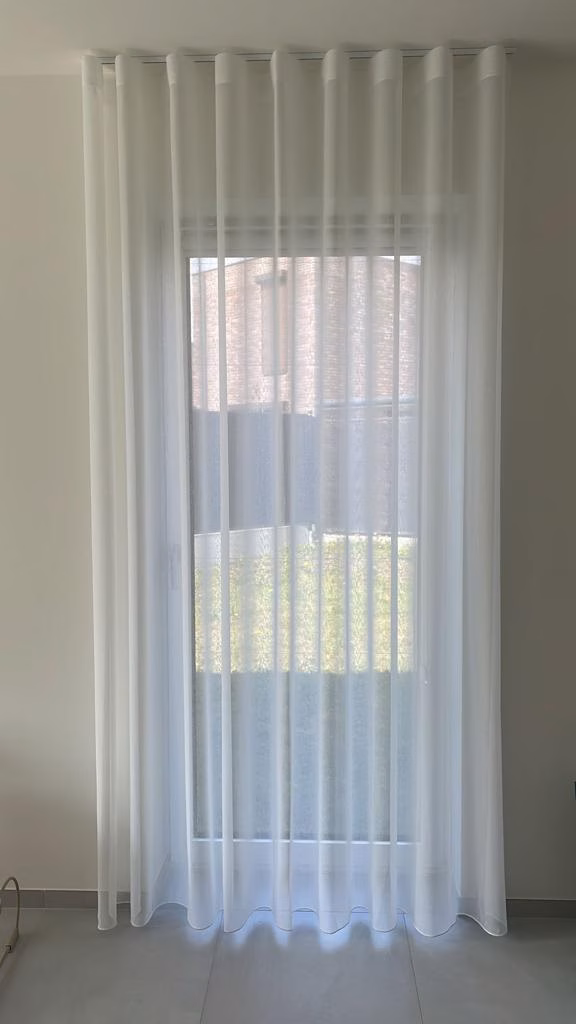 Vitrage en gordijnen gecombineerd voor optimale sfeer